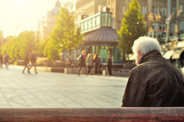 dementia care old guy sitting on bench